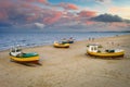 Amazing sunset with fishing boats at the beach of Baltic Sea in Sopot, Poland Royalty Free Stock Photo