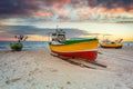 Amazing sunset with fishing boats at the beach of Baltic Sea in Sopot, Poland Royalty Free Stock Photo