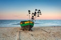Amazing sunset with fishing boats at the beach of Baltic Sea in Sopot, Poland Royalty Free Stock Photo