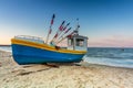 Amazing sunset with fishing boats at the beach of Baltic Sea in Sopot, Poland Royalty Free Stock Photo