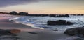 Amazing sunset in low tide on the wild rocky seashore in Menaham, Brittany, France Royalty Free Stock Photo