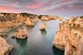 Amazing sunset at Marinha Beach in the Algarve, Portugal. Landscape with strong colors of one of the main holiday destinations in