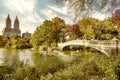 Amazing sunset over Bow Bridge and The Lake in Central Park. Foliage colors of New York City Royalty Free Stock Photo