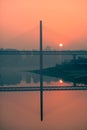 Amazing sunset over a bridge and river