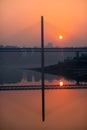 Amazing sunset over a bridge and river