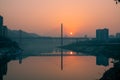 Amazing sunset over a bridge and river