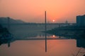 Amazing sunset over a bridge and river