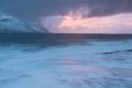 Amazing Sunset Over Mountain And Fjord, Winter Landscape, Norway The sun sets on the Norwegian Alps and the blue hour. Royalty Free Stock Photo