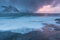 Amazing Sunset Over Mountain And Fjord, Winter Landscape, Norway The sun sets on the Norwegian Alps and the blue hour. Royalty Free Stock Photo