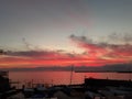 An amazing sunset over the sea of Genova in spring days with some people Royalty Free Stock Photo