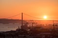 Amazing sunset on Ponte 25 de Abril Bridge, 25th of April Bridge at Lisbon