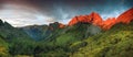 Amazing sunset and red afterglow in high mountains. Royalty Free Stock Photo