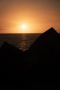 Amazing sunset, rocks and stones at foreground. Puerto Rico, Gran Canaria, Spain Royalty Free Stock Photo