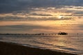 Amazing Sunset on the Sea. Adriatic sea with shore. Lignano Sabbiadoro, Italy. Royalty Free Stock Photo