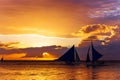 Amazing sunset at sea. Sailboat Royalty Free Stock Photo