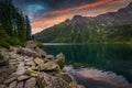 Amazing sunset in the Tatra Mountains above Eye of the Sea Lake, Poland Royalty Free Stock Photo