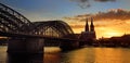 Amazing sunset view on Cologne Cathedral and Hohenzollern Bridge in Koel, Germany Royalty Free Stock Photo
