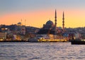 Amazing sunset view of the Golden Horn bay in Istanbul, Turkey. Suleymaniye mosque and New mosque in Sultanahmet district. Travel Royalty Free Stock Photo