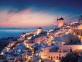 Amazing sunset view with white houses in Oia village on Santorini island in Greece Royalty Free Stock Photo