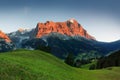 Amazing Swiss alpine mountain landscape, green fields and high mountains with snowy peaks in background, Grindelwald, Interlaken