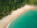 Aerial view of an amazing white sandy beach with turquoise water in tropical country Royalty Free Stock Photo