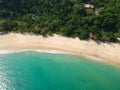 Aerial view of an amazing white sandy beach with turquoise water in tropical country Royalty Free Stock Photo