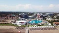 Amazing top view on tropical luxury hotel With swimming pool at near ocean. Video. Top view of the luxury hotel near the Royalty Free Stock Photo