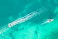 Amazing top view of yacht. Aerial view of luxury floating small ship in blue Caribbean sea. Yacht at the sea in Cancun Royalty Free Stock Photo