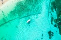 Amazing top view of yacht. Aerial view of luxury floating small ship in blue Caribbean sea. Yacht at the sea in Cancun Royalty Free Stock Photo