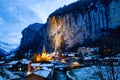 amazing touristic alpine village at night in winter with famous church and Staubbach waterfall Lauterbrunnen Switzerland Europe
