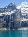 Amazing tourquise Oeschinnensee with Swiss Alps Kandersteg