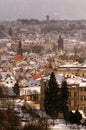 Amazing towers of Charles bridge and old town district during winter day. Heavy snow storm, Prague, Czech republic