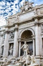 Amazing Trevi Fountain with antique statues against the blue sky. Rome. Italy. Royalty Free Stock Photo