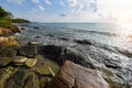 Amazing tropical beach rocky coast / sea ocean paradise landscape sunrise or sunset sea blue sky