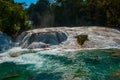 Amazing Turquoise-blue water of the waterfall Agua Azul in Chiapas, Palenque, Mexico. Royalty Free Stock Photo