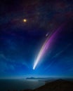 Amazing unreal background: giant colorful comet in starry sky over calm sea and mountains. Comet is icy small Solar System body