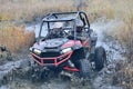 Amazing UTV driving in mud and water at Autumn day