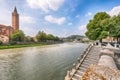 Amazing Verona cityscape view on the riverside with historical buildings and towers