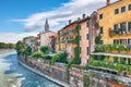 Amazing Verona cityscape view on the riverside with historical buildings and towers