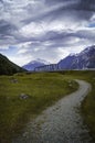 Amazing vertical shot of a bridge in a mountain landscape