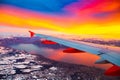 Amazing view from the airplane window during the sunset over mountains in Switzerland Royalty Free Stock Photo