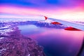 Amazing view from the airplane window during the sunset over Geneva Lake in Switzerland Royalty Free Stock Photo