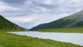 Amazing view of Akkem Lake, Altai, Russia. Hike to the foot of Belukha. Picturesque green mountain valley Royalty Free Stock Photo