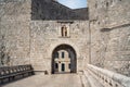 One of the many stone arched gates of the old town of Dubrovnik Royalty Free Stock Photo