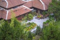 Amazing view of buddhist monastery and courtyard garden with flowers and bonsai trees in Bana hill, tourism site in Da Nang, Royalty Free Stock Photo