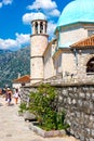 Amazing view of the church with a blue bath on the island of the Virgin on a reef in the Bay of Kotor, Montenegro Royalty Free Stock Photo