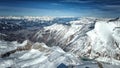 View from a drone over the snowy mountain hills Royalty Free Stock Photo