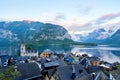 Amazing view of famous Hallstatt mountain village with Hallstatter lake in Austrian Alps. Autumn sunset on Hallstatt lake