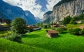 Amazing view of famous Lauterbrunnen town with beautiful Staubbach waterfalls in the background, Switzerland