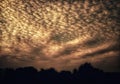 An amazing view of glowing clouds in the sunset sky Royalty Free Stock Photo